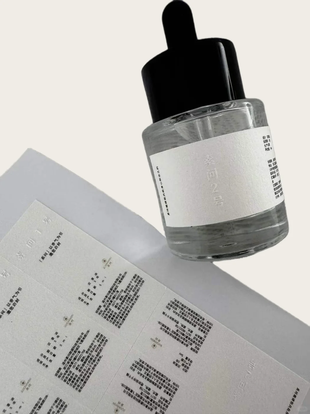 Textured label on a cosmetic bottle with sheet examples