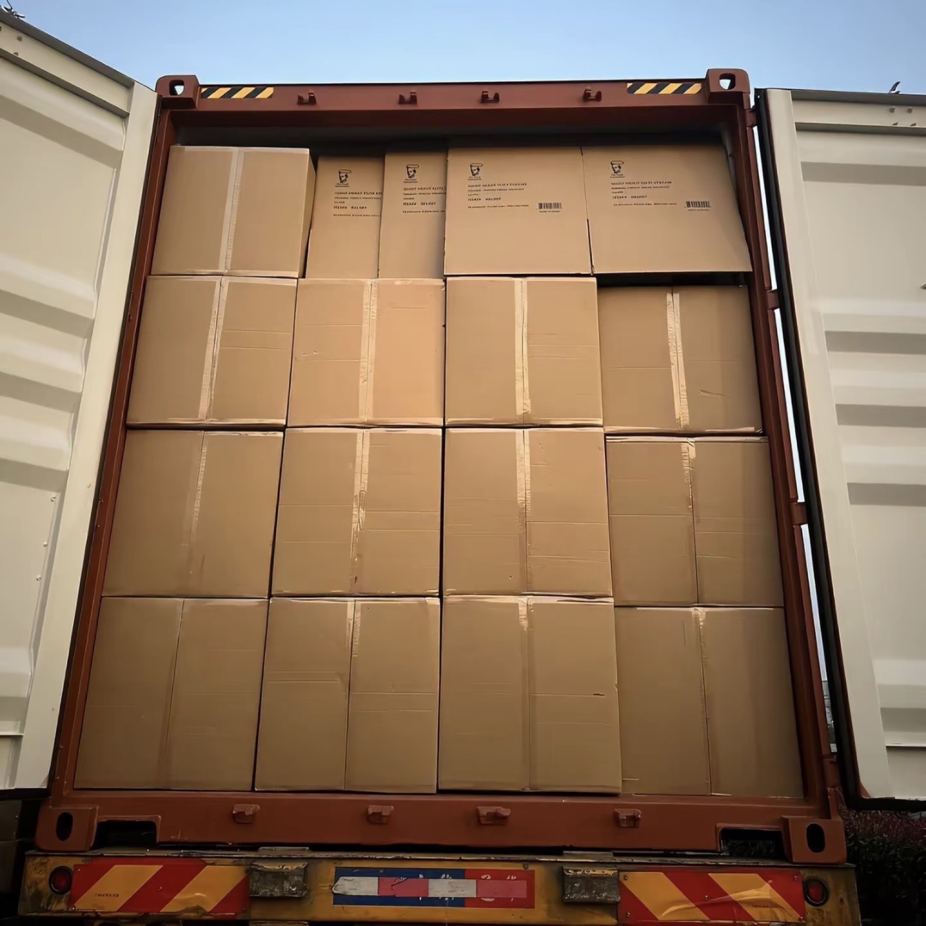 Packed cartons loaded in a shipping container