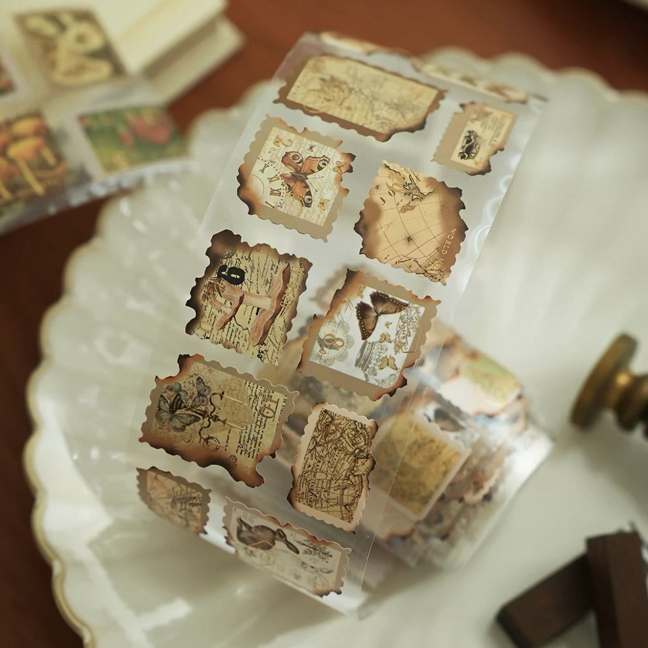 A roll of vintage-style clear labels prepared for dispensing.